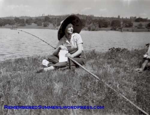 My mother fishing; proud of her very pale complexion, she wore this gigantic straw hat for gardening and outdoors work.